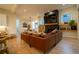 Open concept living room with hardwood floors, fireplace, and leather sectional sofa at 1122 Nw Rice Nw St, Atlanta, GA 30318