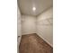 Large walk-in closet with wire shelving and carpeted flooring at 6421 Mountain Home Way, Mableton, GA 30126