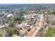Aerial view showing home's location in a wooded neighborhood at 879 Old Tucker Rd, Stone Mountain, GA 30087