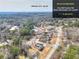 Aerial view showcasing home and surrounding area, near Atlanta at 879 Old Tucker Rd, Stone Mountain, GA 30087