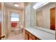 Clean bathroom with shower, toilet, and vanity at 879 Old Tucker Rd, Stone Mountain, GA 30087