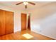 Bright bedroom with hardwood floors and double closets at 879 Old Tucker Rd, Stone Mountain, GA 30087