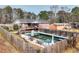 Inviting in-ground pool with surrounding patio at 879 Old Tucker Rd, Stone Mountain, GA 30087