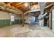 Spacious unfinished basement with multiple rooms and high ceilings at 1058 Hickory Rd, Canton, GA 30115