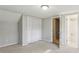 Bedroom with neutral walls, carpet and access to bath at 1058 Hickory Rd, Canton, GA 30115