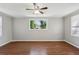 Bright bedroom with hardwood floors and large window at 1058 Hickory Rd, Canton, GA 30115