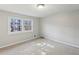 Bright bedroom with neutral walls and carpet at 1058 Hickory Rd, Canton, GA 30115