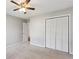 Bedroom with neutral walls, carpet and large closet at 1058 Hickory Rd, Canton, GA 30115