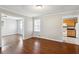 Dining room with hardwood floors and kitchen access at 1058 Hickory Rd, Canton, GA 30115