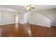 Spacious living room with hardwood floors and a view to kitchen at 1058 Hickory Rd, Canton, GA 30115