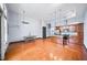 Open concept living space with hardwood floors, modern kitchen, and island at 1195 Milton Se Ter # 2305, Atlanta, GA 30315