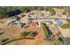 Aerial view of neighborhood with homes and greenery at 160 Thistlewood Ln, Fayetteville, GA 30214