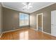 Bedroom with hardwood floors, large window and closet at 160 Thistlewood Ln, Fayetteville, GA 30214