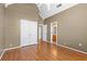 Bedroom with hardwood floors and double door closet at 160 Thistlewood Ln, Fayetteville, GA 30214