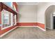 Bright dining room with large windows and two-toned walls at 160 Thistlewood Ln, Fayetteville, GA 30214