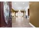 Elegant entryway with tile flooring and views into the living areas at 160 Thistlewood Ln, Fayetteville, GA 30214