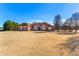 Brick home with a large front yard at 160 Thistlewood Ln, Fayetteville, GA 30214