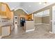 Open kitchen with light wood cabinets and granite countertops at 160 Thistlewood Ln, Fayetteville, GA 30214