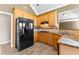 Modern kitchen with black appliances and granite countertops at 160 Thistlewood Ln, Fayetteville, GA 30214