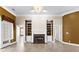 Spacious living area featuring a fireplace and built-in shelves at 160 Thistlewood Ln, Fayetteville, GA 30214