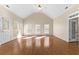 Bright sunroom featuring hardwood floors and abundant natural light at 160 Thistlewood Ln, Fayetteville, GA 30214