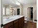 Bathroom with double vanity, walk-in shower, and large closet at 18 Ponders Se Rd, Cartersville, GA 30121