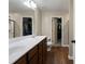 Bathroom with double vanity, walk-in shower, and large closet at 18 Ponders Se Rd, Cartersville, GA 30121