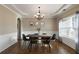 Formal dining room with hardwood floors, chandelier and wainscoting at 18 Ponders Se Rd, Cartersville, GA 30121