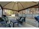 Covered patio with seating area at 18 Ponders Se Rd, Cartersville, GA 30121