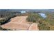 Aerial view of lakefront lots with wooded areas and lake access at 410 Newland Way, Acworth, GA 30102