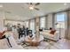 Open living room and kitchen with white sofas and a wooden coffee table at 410 Newland Way, Acworth, GA 30102