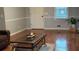 Living room with hardwood floors and a coffee table at 904 Little River Ln, Woodstock, GA 30189