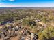 Wide aerial view of homes and landscape at 9994 Inisfree Dr, Johns Creek, GA 30022