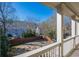 View from deck showcasing backyard, firepit and playground at 9994 Inisfree Dr, Johns Creek, GA 30022