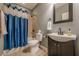 Basement bathroom with shower/tub combo and updated vanity at 9994 Inisfree Dr, Johns Creek, GA 30022