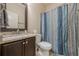 Bathroom with granite vanity and shower/tub combo at 9994 Inisfree Dr, Johns Creek, GA 30022