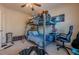 bedroom with bunk bed, desk, and large wall art at 9994 Inisfree Dr, Johns Creek, GA 30022