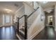 Elegant entryway with hardwood floors, staircase, and ample natural light at 9994 Inisfree Dr, Johns Creek, GA 30022