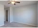 Spacious bedroom with large closet and ceiling fan at 104 Holly Mill Village Dr, Canton, GA 30114