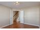 Spacious bedroom with hardwood floors and double doors at 104 Holly Mill Village Dr, Canton, GA 30114