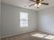 Bright bedroom with carpeted floor and window at 104 Holly Mill Village Dr, Canton, GA 30114