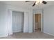 Bedroom with walk in closet and ceiling fan at 104 Holly Mill Village Dr, Canton, GA 30114