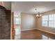 Formal dining room with hardwood floors and a chandelier at 104 Holly Mill Village Dr, Canton, GA 30114