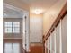 Bright and spacious entryway with hardwood floors and a staircase at 104 Holly Mill Village Dr, Canton, GA 30114