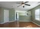 Living room with hardwood floors and access to kitchen at 104 Holly Mill Village Dr, Canton, GA 30114