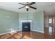 Living room with fireplace and hardwood floors at 104 Holly Mill Village Dr, Canton, GA 30114