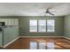 Spacious living room featuring hardwood floors and lots of natural light at 104 Holly Mill Village Dr, Canton, GA 30114