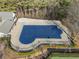 Aerial view of community pool with cover at 104 Holly Mill Village Dr, Canton, GA 30114