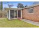 Inviting sunroom addition with sliding glass doors and access to the yard at 1151 Mohican Trl, Stone Mountain, GA 30083