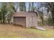 Storage shed in backyard providing additional storage space at 1151 Mohican Trl, Stone Mountain, GA 30083